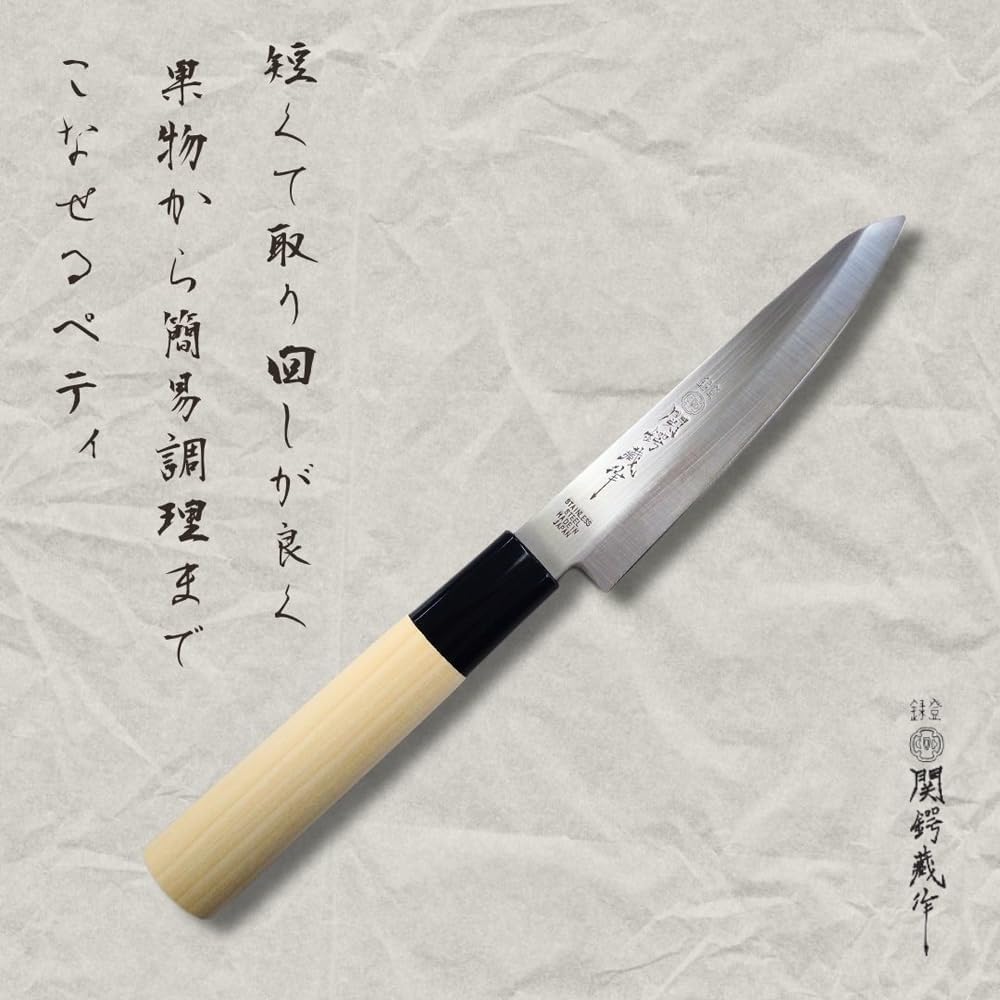 Japanese knife with a wooden handle on a textured gray background