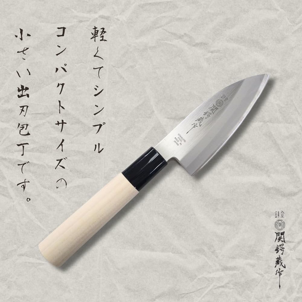 Japanese knife with a white handle on a textured gray background